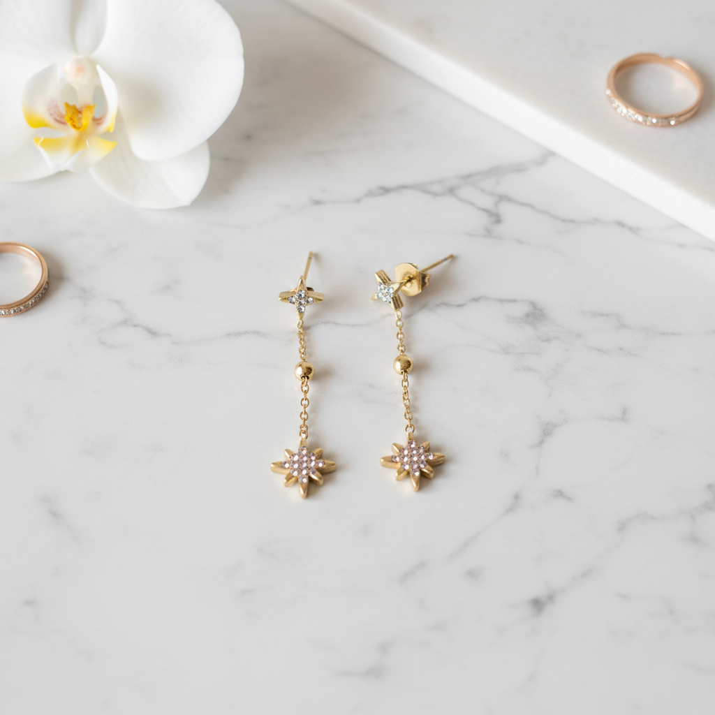 Boucles dorées étoiles sur marbre
