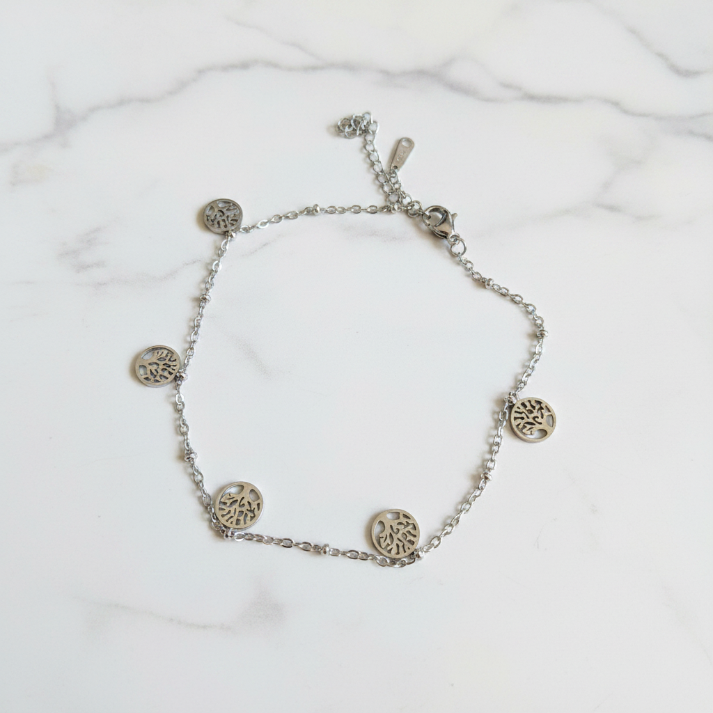 Bracelet argenté arbre de vie sur marbre blanc