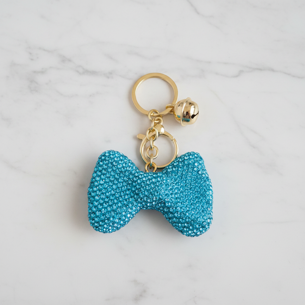 Porte-clé nœud turquoise sur marbre